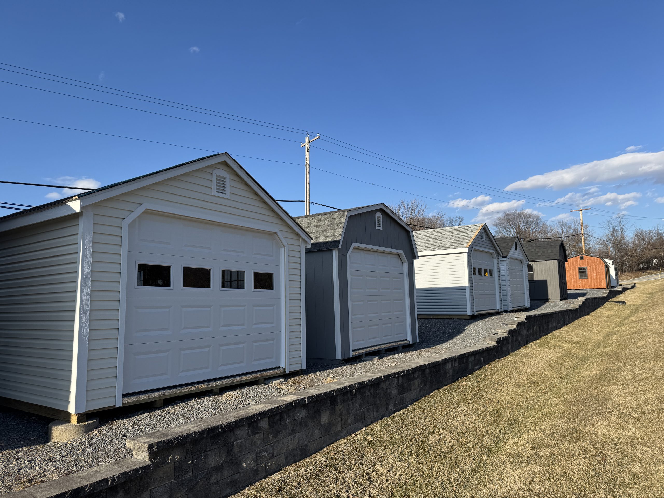 Fredrick MD Sheds 6 in row, all different styles